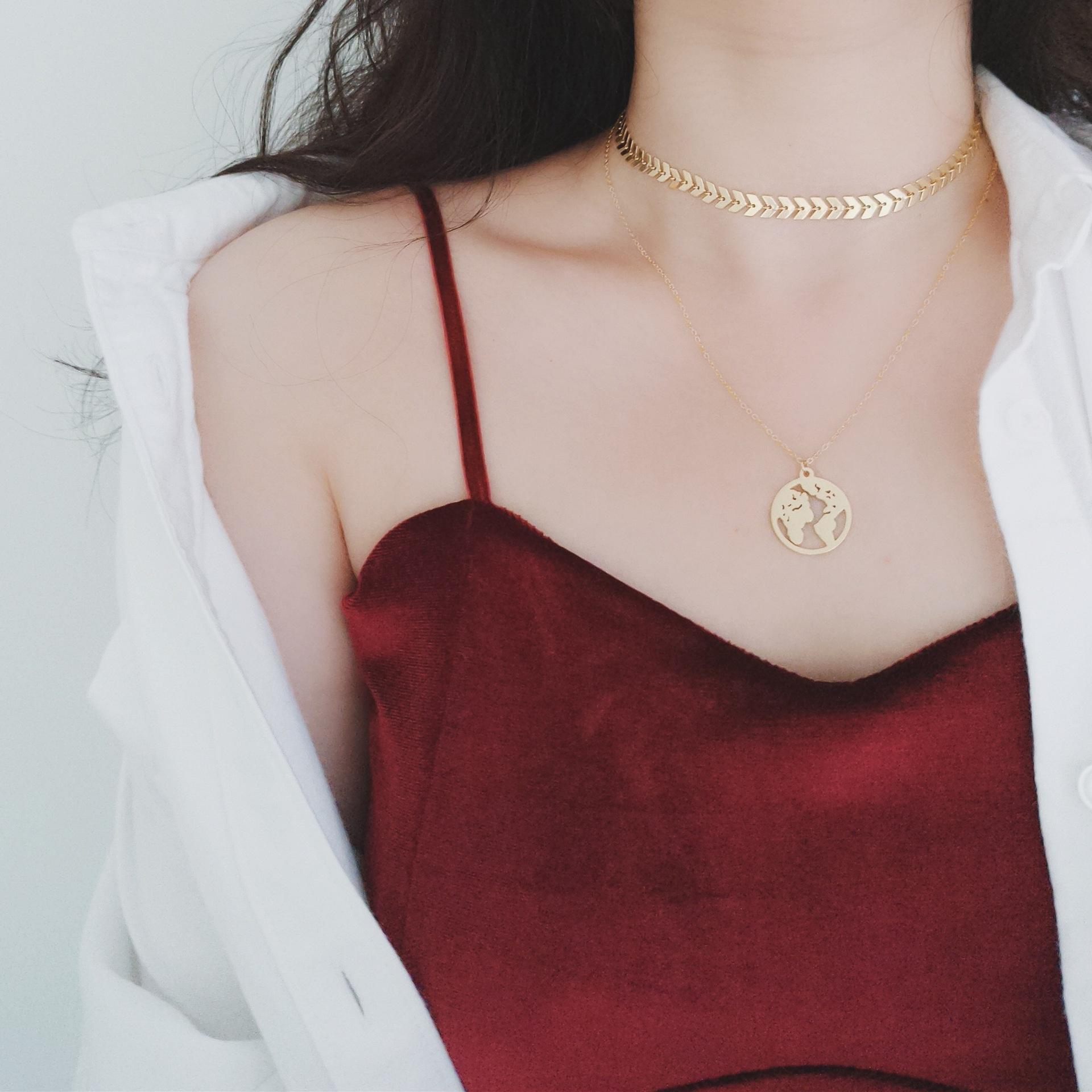 Wanderlust Cutout World Map Pendant Necklace