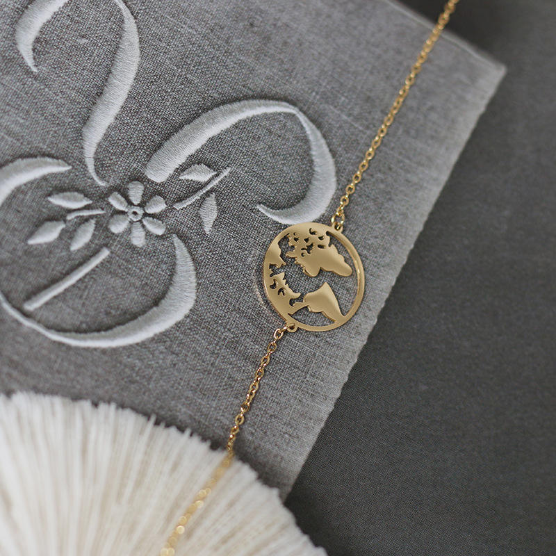 Wanderlust Cutout World Map Pendant Necklace